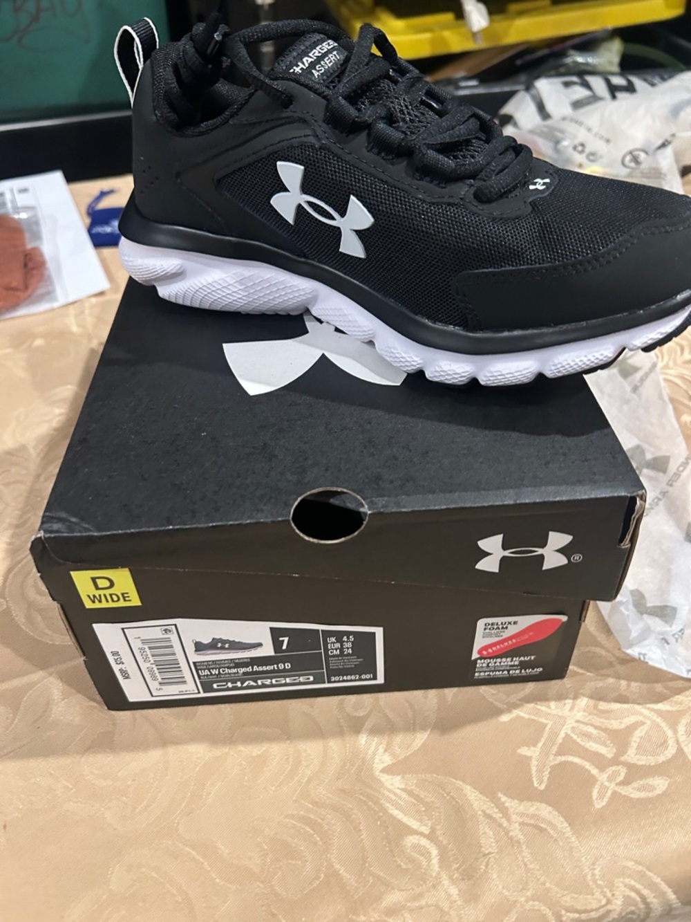 Under Armour Black and White Men's Charged Running Sneakers